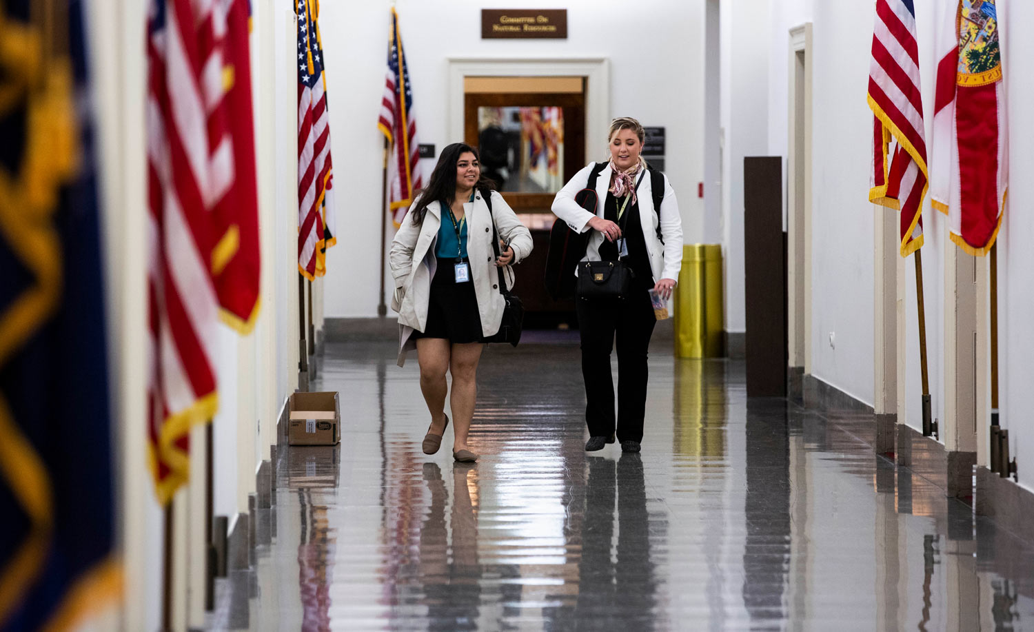 Two ASU students walk through the halls of the U.S. Capitol building on the way to a House subcommittee meeting.