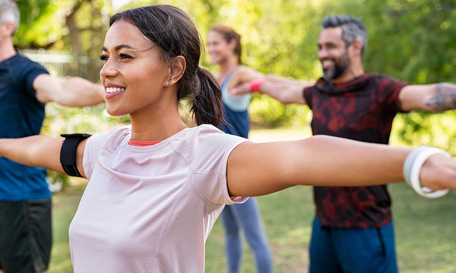 A community health and well-being student leads a community wellness event.